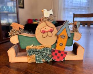 Wooden Santa-like figure with birds 6"H x 10"W