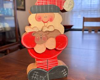 Wooden Santa carrying a baby reindeer 9"H