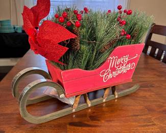 Large wooden Merry Christmas sleigh with evergreen arrangement 13"H x 20"L