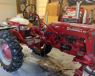1950 Farmall tractor with attachments. Driven annually in the Christmas parade. Can be sold presale.