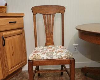 One of six matching chairs that go with the table for $300