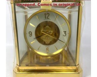 Lot 17 LE COULTRE Brass and Glass Case ATMOS Clock. Clock is presently shrink wrapped. Comes in original sh