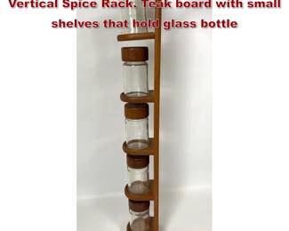 Lot 102 DIGSMED Danish Modern Teak Vertical Spice Rack. Teak board with small shelves that hold glass bottle