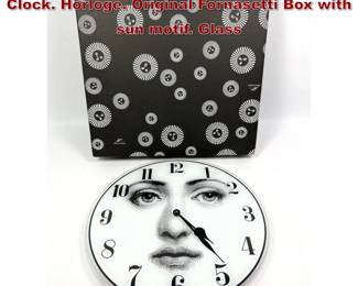 Lot 265 PIERO FORNASETTI Julia Face Wall Clock. Horloge. Original Fornasetti Box with sun motif. Glass 