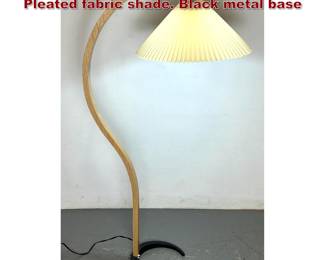 Lot 189 CAPRANI. Laminated wood arm. Pleated fabric shade. Black metal base