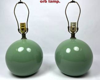 Lot 339 Pair Green pottery spherical orb lamp. 