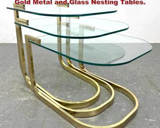 Lot 174 3pc DIA Design Institute of America Gold Metal and Glass Nesting Tables.