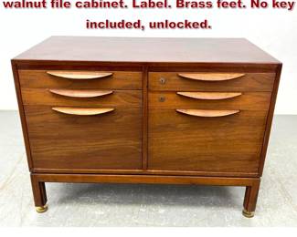 Lot 427 JENS RISOM designs 6 drawer walnut file cabinet. Label. Brass feet. No key included, unlocked. 