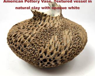 Lot 42 Anne Goldman Sea Erosion American Pottery Vase. Textured vessel in natural clay with opaque white 