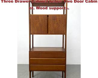 Lot 518 Danish Modern Teak Storage Unit. Three Drawer Cabinet below Two Door Cabin et. Wood supports. 