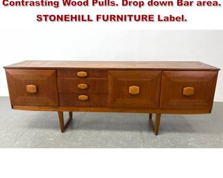 Lot 432 Walnut Credenza Cabinet. Contrasting Wood Pulls. Drop down Bar area. STONEHILL FURNITURE Label. 
