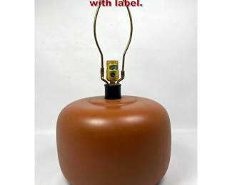Lot 438 Raymor pottery table lamp with label.