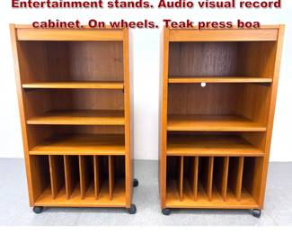 Lot 497 2pcs Danish Modern Teak Entertainment stands. Audio visual record cabinet. On wheels. Teak press boa