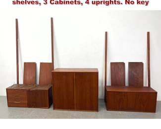 Lot 523 Scandinavian Teak Wall Unit Shelf. 4 shelves, 3 Cabinets, 4 uprights. No key 