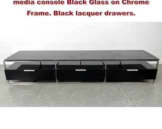 Lot 509 Italian Cantoni black glass low media console Black Glass on Chrome Frame. Black lacquer drawers.