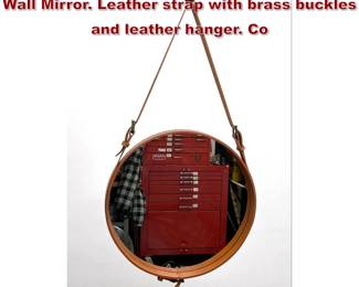 Lot 335 GUBI Leather Strap Framed Round Wall Mirror. Leather strap with brass buckles and leather hanger. Co