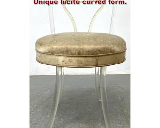Lot 519 Lucite swiveling vanity stool. 1940s. Unique lucite curved form.
