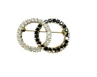 Lot 64   0 Bid(s)
Interlocking Circle Rhinestone Brooch