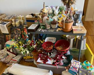 NWT Christmas and Easter items, soaps, candles, insulated cups, decorative plate and carving boards, and wall hanging’s. Baby pack and play. 