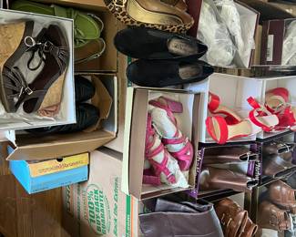 Shoes, many brands and few with store tags still attached.