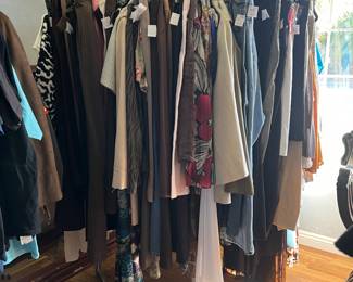 Women’s clothes consist of size Med, Large, XLarge, XXlarge, and all assorted on the racks by sizes to help with locating the correct size. Shirts, blouses, jeans, slacks, dresses, and evening gowns. 
