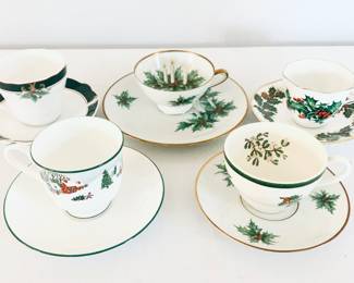 CHRISTMAS CUP AND SAUCERS