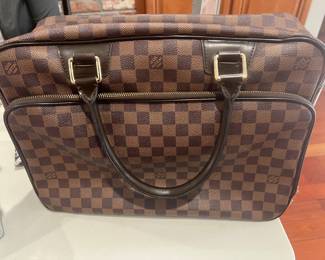 Louis Vuitton authentic ladies business or travel bag, in new condition 