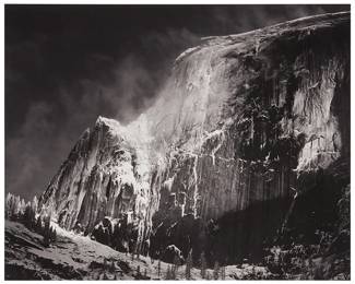 29
Ansel Adams
1902-1984
"Half Dome, Blowing Snow," Circa 1955
Silver gelatin print on paper mounted to illustration board
From the edition printed in 1976 for "Portfolio VII"
Signed in pencil on the illustration board, lower right: Ansel Adams; titled and dated in ink, and with the artist's Carmel studio ink stamp, all on the verso of the illustration board
Image/Sheet: 15.5" H x 19.5" W; Sight: 16.25" H x 20" W
Estimate: $15,000 - $20,000