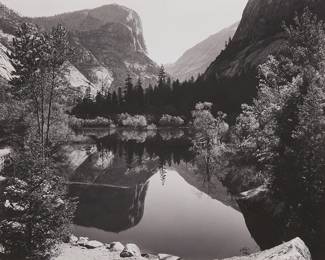 32
Ansel Adams
1902-1984
"Mirror Lake" (Yosemite Valley And Mt. Watkins)
Gelatin silver print on paper mounted to a board mount
Edition: 417 of S.E.Y. [special edition Yosemite], printed 1958-1972
Signed in ink on the mount, at right: Ansel Adams; titled, numbered and inscribed No. 6, all in ink in the corresponding blanks of the special edition Photographs of Yosemite black ink stamp on the verso of the mat board mount
Image/Sheet: 7.75" H x 9.75" W; Mount: 13.5" H x 16.375" W
Estimate: $2,000 - $3,000