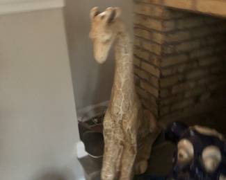 Carved giraffe sculpture