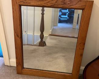 Wood framed wall mirror