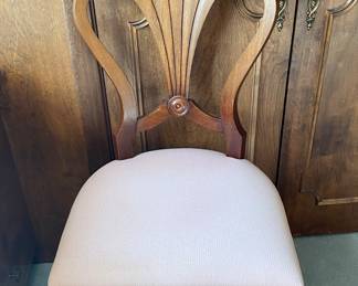 one of 3 shell back chairs