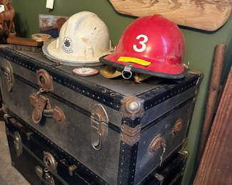Old chests, fireman helmet and Chief helmet. Boat paddle no longer available. 