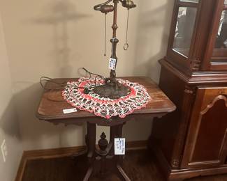 My research leads me to think this is a Tiffany lamp but I cannot find the mark. Lamp shade missing. 