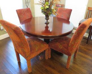 Set of 4 parson style dining chairs - they look more orange in this photo but are more of a rusty red and gold.