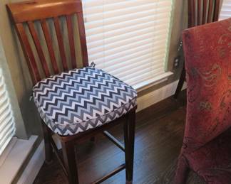 Pair of wood barstools with cushions