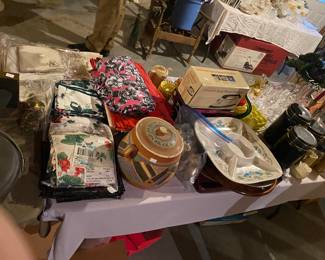 clay pot, platters, irons, table linens, canister set