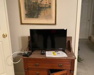 wash stand with marble top, tv with remote