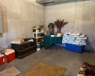 large tote, vintage trunk, 3 Army flak jackets, lamp and misc