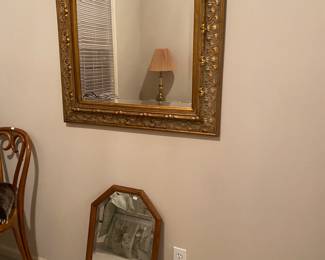 large mirror and smaller mirror