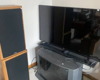 Tv stand, LG tv w/remote,  fun large speakers 