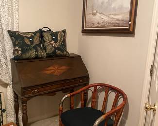 antique secretary, pillows and artwork (other bamboo chair, on wheels)
