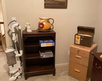 vintage bookshelf, filing cabinet, shark vacuum, cool large pitcher 
