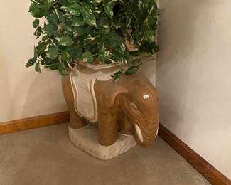 ceramic elephant and silk flowers