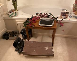 side table, scale, boots, silk flowers 
