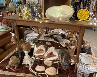 This is a larger occasional table that is sitting atop the dining table. Could be used on in a covered Florida room! Sunday Special