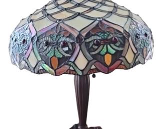 One of several NICE STAINED glass lamps with bronze base