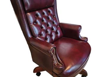 Nice Burgundy office chair on wheels