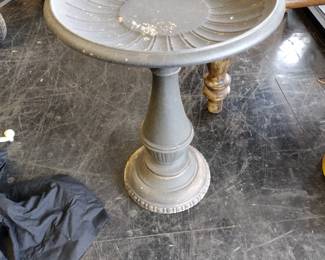 Iron bird bath.