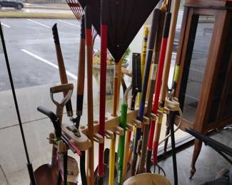 Lots of rakes. shovels and more